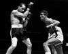 (BOXING) Group of approximately 150 photographs of pugilists in the ring, with prints of the